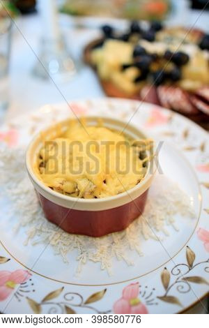 Chicken And Cheese Julienne In A Cocotte-ramequin On The Festive Table