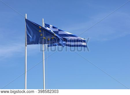 European Union And Greek Flag Flying In The Air In Kos, Greece