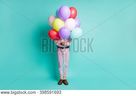 Full Length Photo Of Guy Hide Behind Colorful Hellium Balloons Formalwear Yellow Socks Isolated Teal