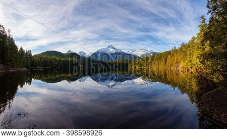 Beautiful Peaceful Panoramic View Of Levette Lake With Famous Tantalus Mountain Range In The Backgro