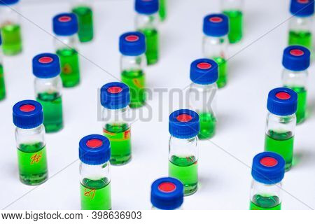 Pattern From Hplc Glass Vials With Green Fluid. Pharmaceuticals And Chemical Analysis.