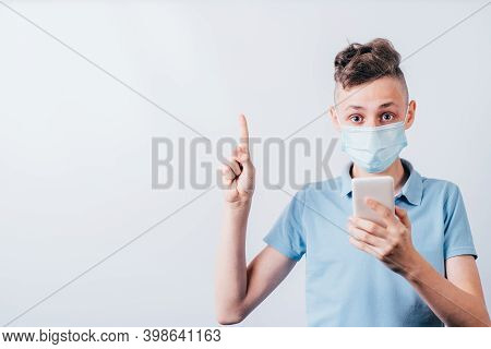 Insight. Important Information. Attention Gesture. Surprised Boy In Medical Mask And Gloves Holding 