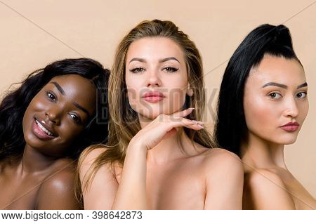 Natural Beauty, Diversity. Three Multiethnic Young Women, Caucasian, African And Asian, With Diffren