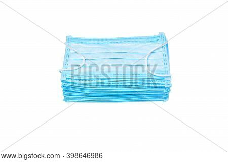 Pile Of Blue Medical Mask Isolated On White Background. Stack Mask. Pile Mask. Disposable Face Masks