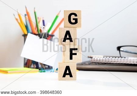 Cork Text Block Of Gafa On Wooden Table