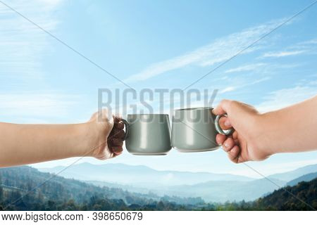 Closeness To Nature. Couple With Cups In Mountains, Closeup