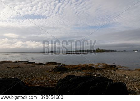 Thick Layered Clouds Over The Coastal Waters Of Casco Bay.