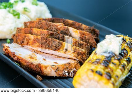 Delicious Creole Crusted Turkey Breast With Mashed Potatoes And Corn On The Cobb Makes The Mouth Wat