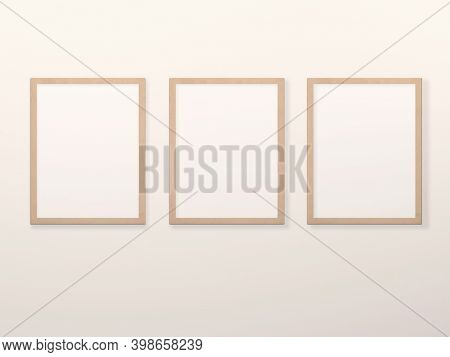Three empty picture frames on wall. Home interior poster mockup with vertical wooden frame. Blank photo frame template set. Mock up frames on living room wall. 3d render
