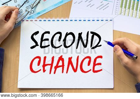 Text Second Chance On Financial Tables With . Business And Financial Conzept. The Working Paper With