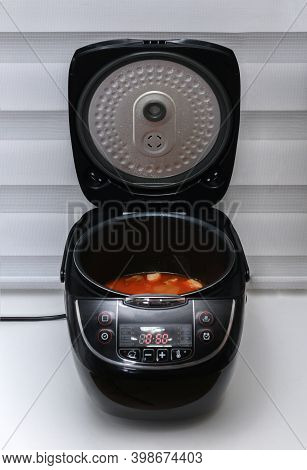 Open Multicooker With Ready-made Meat Goulash. Kitchen Appliances..