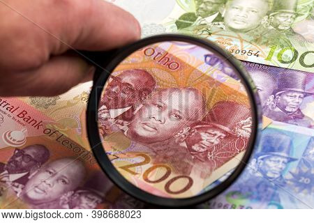 Lesotho Money - Loti In A Magnifying Glass