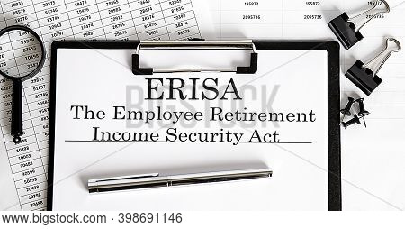 Paper With Employee Retirement Income Security Act Erisa On A Table Chart