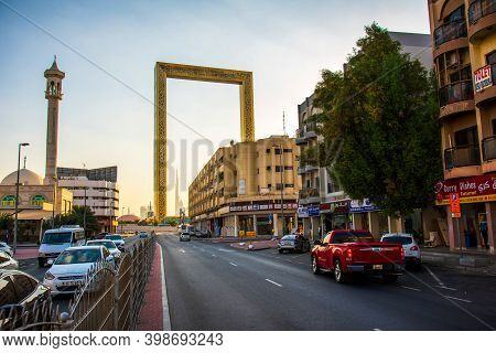 Dubai, United Arab Emirates - November 26, 2020: Old Neighborhood Of Al Karama With Dubai Frame Risi