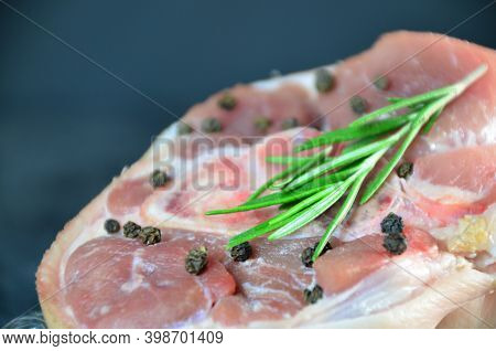 Pieces Of Raw Pork Steaks, With Ingredients For Cooking, Served On Woodenboard. Concept Of Food Prep