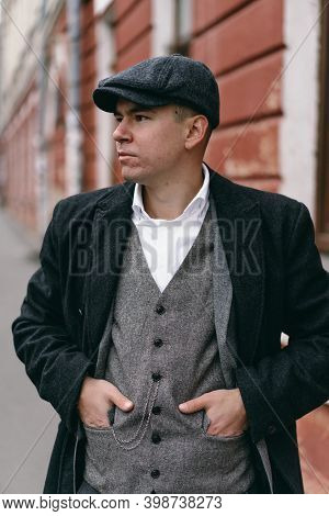 Portrait Of A Man In Retro Style. Peaky Blinders. Vintage.