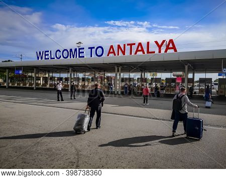Antalya, Turkey - October 21, 2020: Large Signboard Welcome To Antalya At Airport. Tourists With Sui
