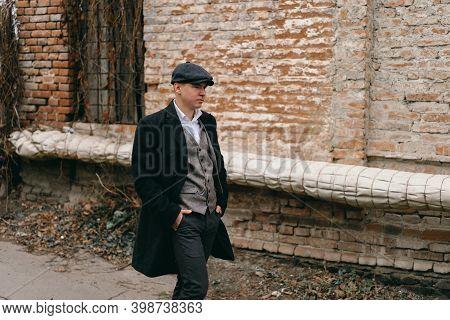 Portrait Of A Man In Retro Style. Peaky Blinders. Vintage.