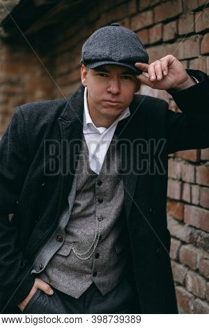Portrait Of A Man In Retro Style. Peaky Blinders. Vintage.