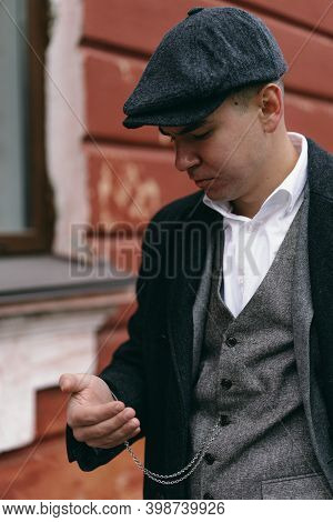 Portrait Of A Man In Retro Style. Peaky Blinders. Vintage.