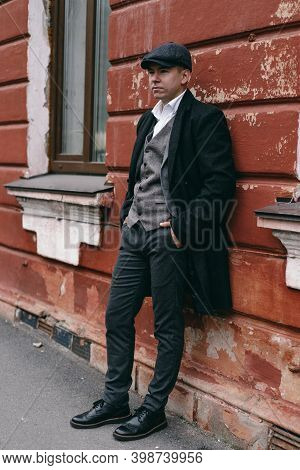 Portrait Of A Man In Retro Style. Peaky Blinders. Vintage.