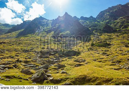 Romanian Carpathian Mountains On A Summer Sunny Day. Amaizing View From Down Up On The Mountains And