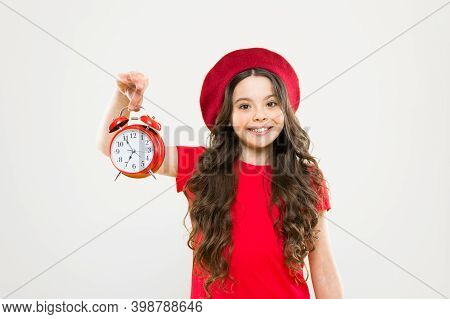 Controlling Personal Time. Schedule And Time. Set Up Alarm Clock. Child Little Girl Hold Red Clock. 