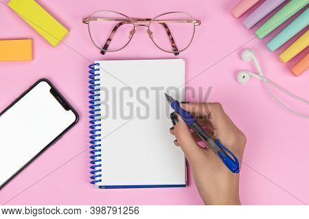 Blank Notebook On A Pink Background