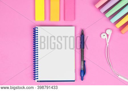 Blank Notebook On A Pink Background