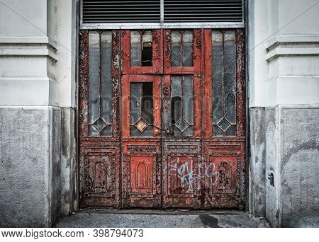 Budapest, Hungary, Aug 2019, Door Of Condemned Building Entrance Lock With A Padlock