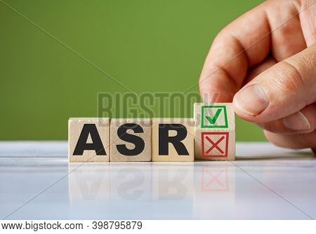 The Hand Turn Wooden Block With Red Reject X And Green Confirm Tick As Change Concept Of Asr. Word A