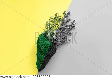 Knitted Shell With Branch Decorating On Yellow And Gray. Sunshine And Shadows. Hellow Summer Concept