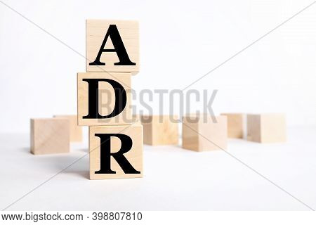 Adr Adverse Drug Reaction. Text On Wood Cubes On White Background