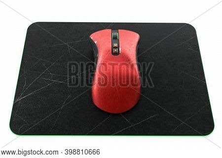 Used Metal Red Gaming Mouse With Scratches On Professional Pad Isolated On White Background Blackgro