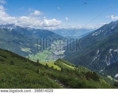 View Over Green Stubai Valley And Neustift Im Stubaital Village From Elferhutte With Moutain Peaks A