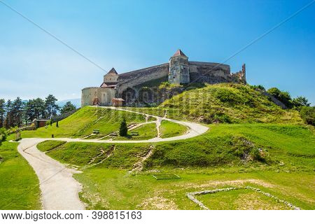 Medieval Fortress In Brasov City, Transylvania, Romania. Historic Citadel Of Transylvania On The Hil