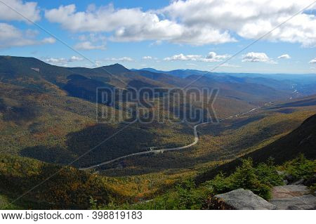 Franconia Notch With Fall Foliage And Highway I-93 Aerial View From Top Of The Cannon Mountain In Fr