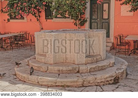 Corfu, Greece, September 28, 2019: Venetian Well In The City Center At Sofokleous Dousmani 46, Krema