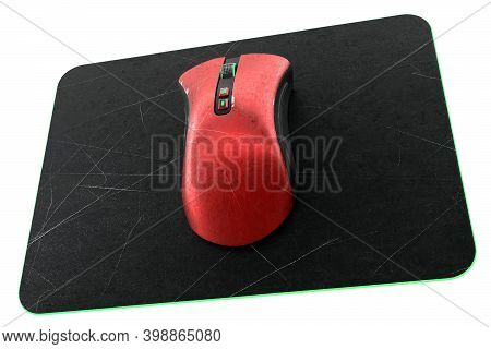 Used Metal Red Gaming Mouse With Scratches On Professional Pad Isolated On White Background Blackgro