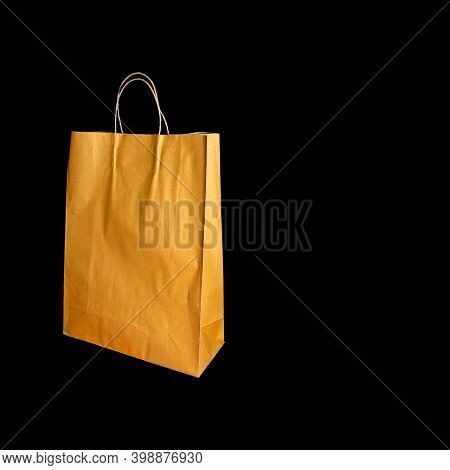 Eco Friendly Shopping Bag Made By Paper Isolated In Black Background