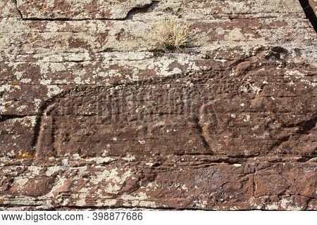 Ancient Rock Carvings Of Petroglyphs Of Animals - Boyarskaya Pisanitsa In The Republic Of Khakassia