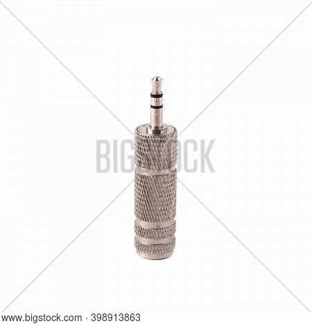 Metal Audio Jack To Mini Jack Adapter, Isolated On White Background. Close Up