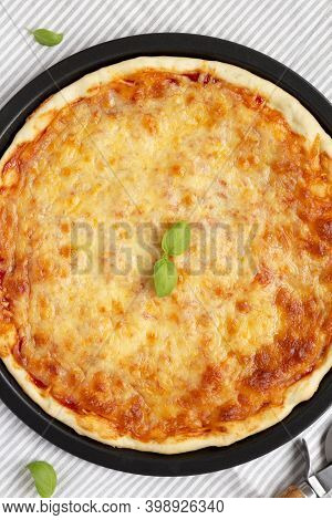 Homemade Neopolitan Pizza With Cheese And Basil, Overhead View. Flat Lay, Top View, From Above.