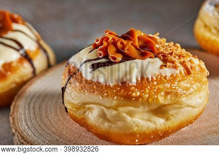 Happy Hanukkah And Hanukkah Sameach Is A Traditional Jewish Donut With Dulce De Leche And Chocolate.