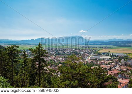Panoramic View From The Top Of Rasnov Citadel, Cetatea Rasnov, On The City And Romanian Carpathians 