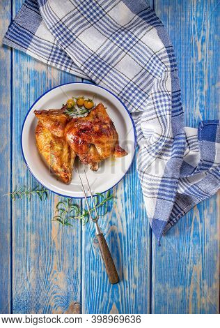 Chicken Quarters Baked On Plate. Top View.