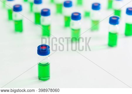 Hplc Vials With Green Sample Of Plant Extracts. Developing Of Drugs Based On Natural Products. Bioch