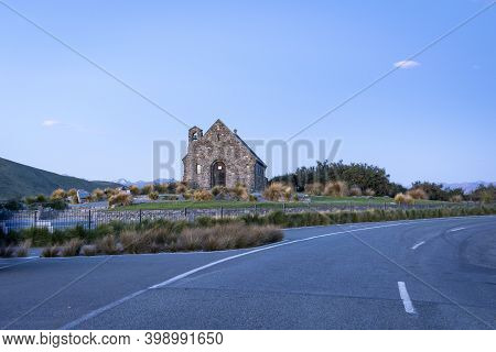 Historic Church Of Good Sheppard Famous Tourist Destination On Shore Of Lake Tekapo At Twilight In N