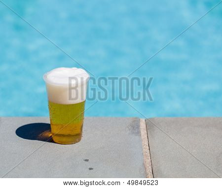 Golden Lager Or Beer In Disposable Plastic Cup