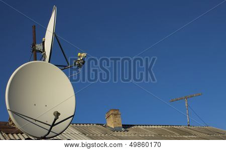 a satellite dish on the roof